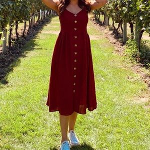 Rust orange coloured dress.